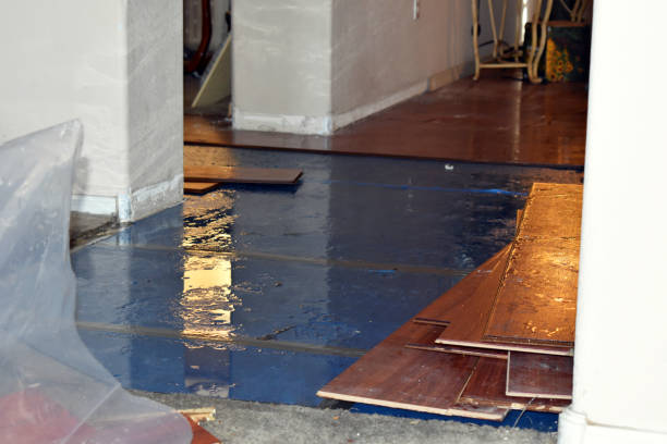 Professional Flood Damage Restoration technician working in Middletown, RI